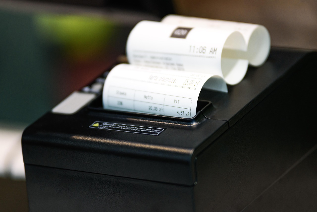 Cash register, printer, receipt — The AR Turnover Ratio Explained: Turning Invoices into Income Faster